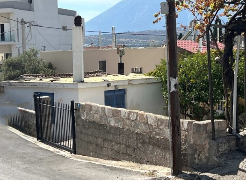 Plot of land with building, Spata