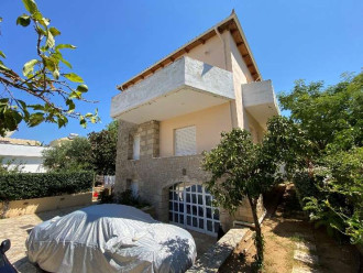 Κτήριο τριών ορόφων, Καρδαμύλη